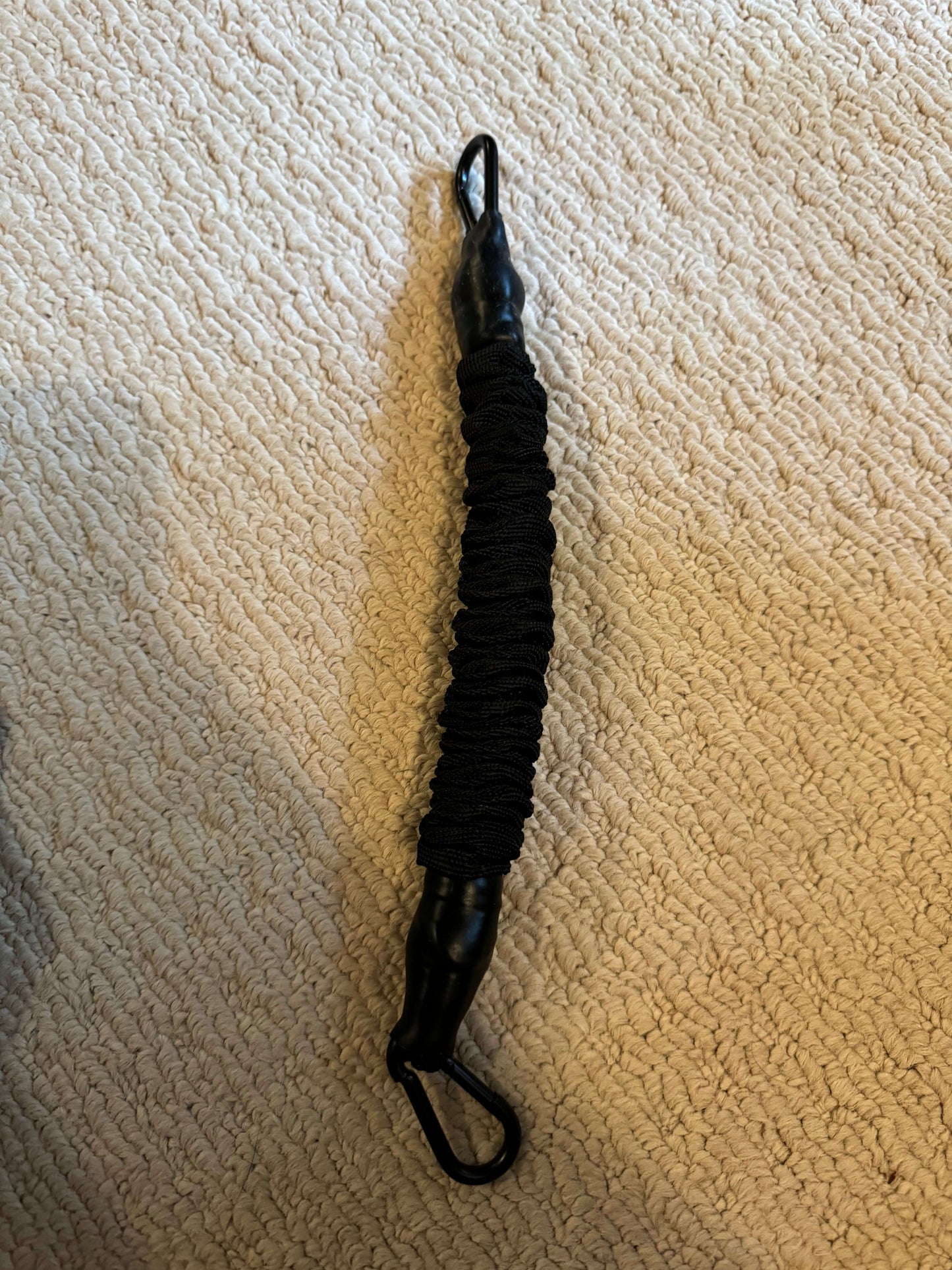 Shorty Superset resistance band, black, designed for strength training and agility workouts.