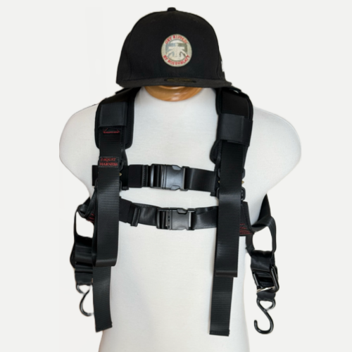 Squat harness v3 is displayed on a mannequin with the front of the harness on display.  2 front closing buckles across the chest, and 2 connector straps with open-ended hooks on each end for convenient weight loading.